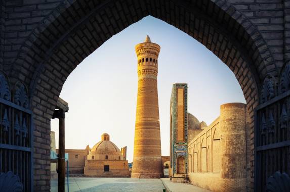 Yard of Poi Kalyan oriental complex at sunset. View from the gate. Bukhara