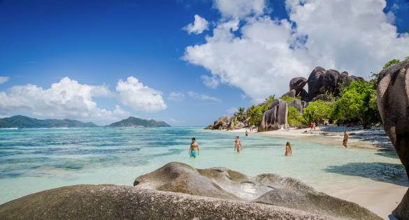 People in Seychelles sea