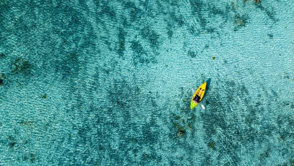 Canoe and kayaks in Polynesia Cook Islands tropical paradise Aitutaki panorama landscape