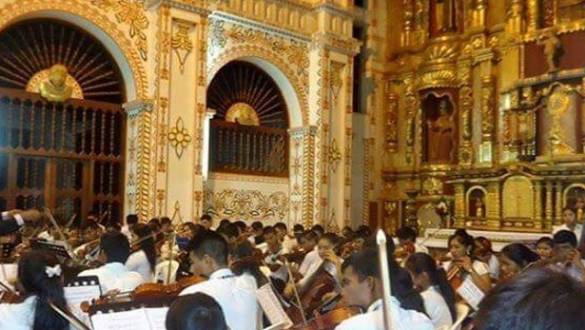 The choir performing inside the church