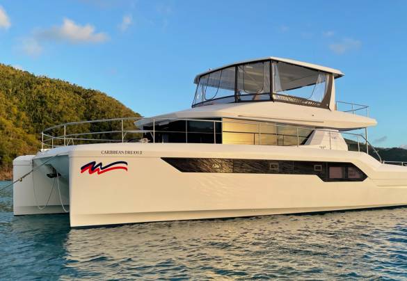 Sun reflecting off of Moorings 534 power cat
