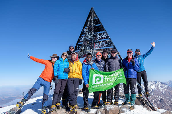 Travellers at the top of a mountain