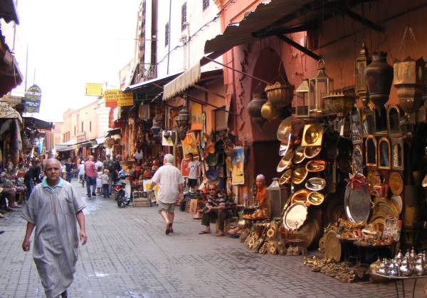 a group of people walking down a street