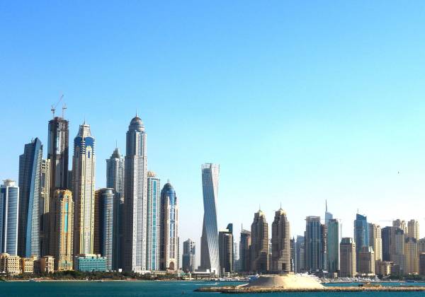 a view of a city with tall buildings in the background