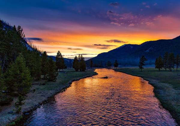 a sunset over a body of water