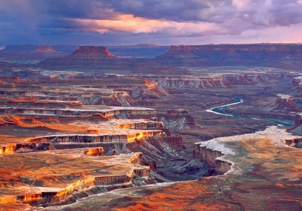 a canyon with a mountain in the background