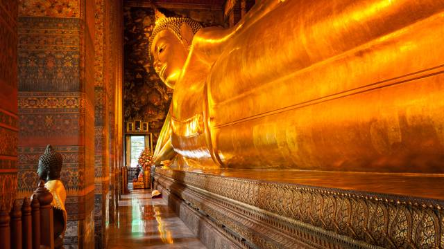 Reclining Buddha gold statue. Wat Pho, Bangkok, Thailand