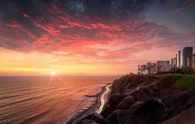 a sunset over a body of water