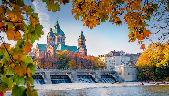 Colorful autumn view of Landmark Protestant St. Luke's Church. Exciting morning cityscape of Munich, Bavaria, Germany, Europe. Traveling concept background.