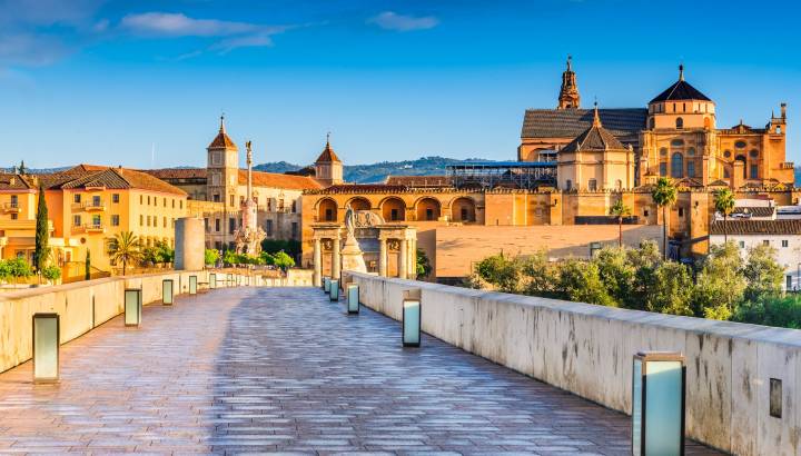 Cordoba, Spain, Andalusia. Roman Bridge on Guadalquivir river and The Great Mosque (Mezquita Cathedral)