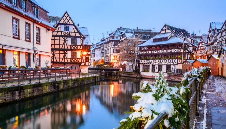 Enchanting Travels France Tours Strasbourg, France. Christmas Market in Petite France old district of Strasbourg in Alsace