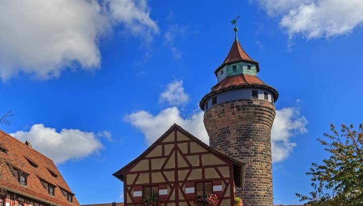 Nuremberg Castle (Sinwell tower) with blue sky and clouds, Germany Tours