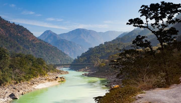 Enchanting Travels India Tours Scenic view at Ganges River in Rishikesh, Uttarakhand, India