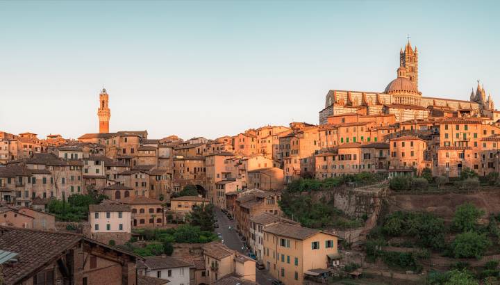Enchanting Travels Italy Tours Panorama of Siena, cityscape, a beautiful medieval town in Tuscany