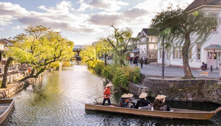 Enchanting Travels Japan Tours Antique Japanese rowing boats at Kurashiki Bikan Historical Quarter