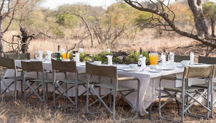 Outdoor dining at Africa on Foot Camp in Kruger Central, South Africa