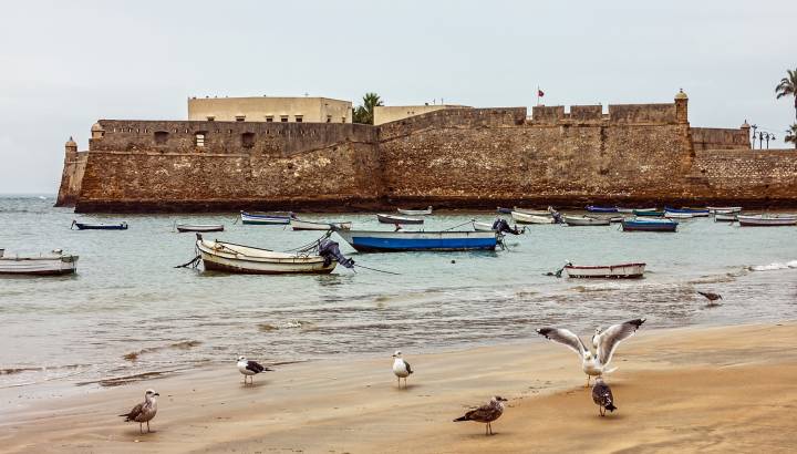 Enchanting Travels Spain Tours Kadiz beach, San Sebastian fortress, Spain