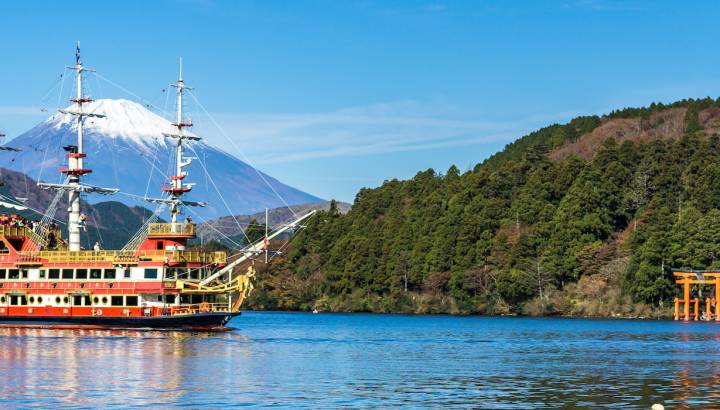 Mountain Fuji and Lake Ashi with Hakone temple and sightseeing boat in autumn