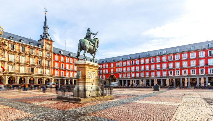Plaza Mayor with statue of King Philips III in Madrid, Spain