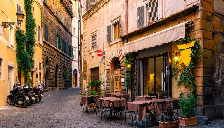 View of old cozy street in Rome, Italy. Architecture and landmark of Rome. Postcard of Rome.