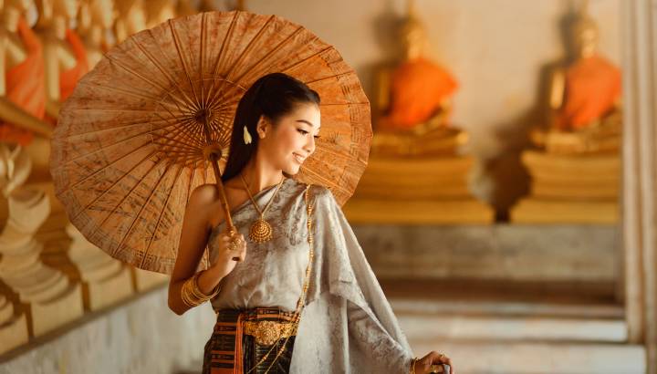 Thailand travel - Asian woman wearing traditional Thai culture,vintage style,Thailand