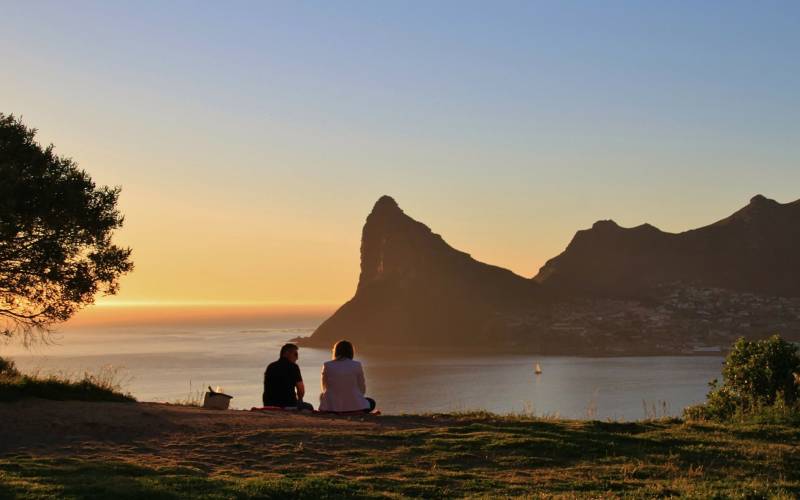 a sunset over a body of water