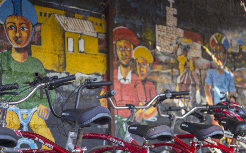 a motorcycle parked on the side of a building