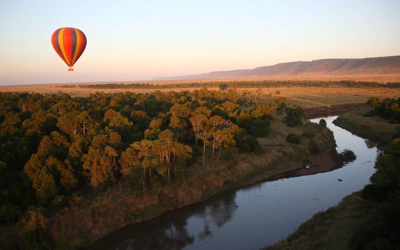 a sunset over a body of water