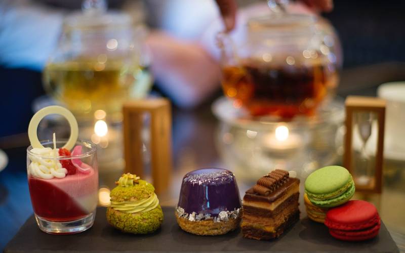 a close up of a plate of birthday cake on a table