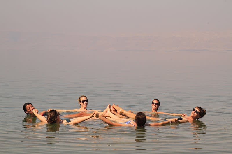Floating in the salty waters of the Dead Sea