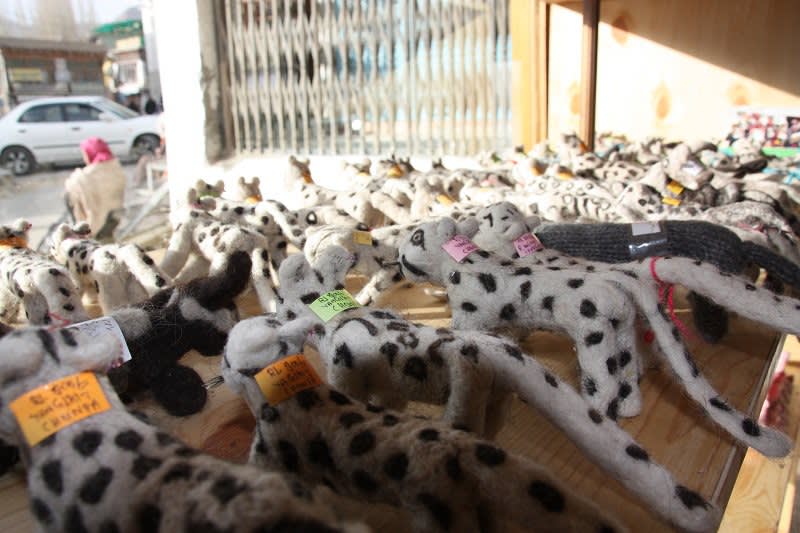 felt snow leopards