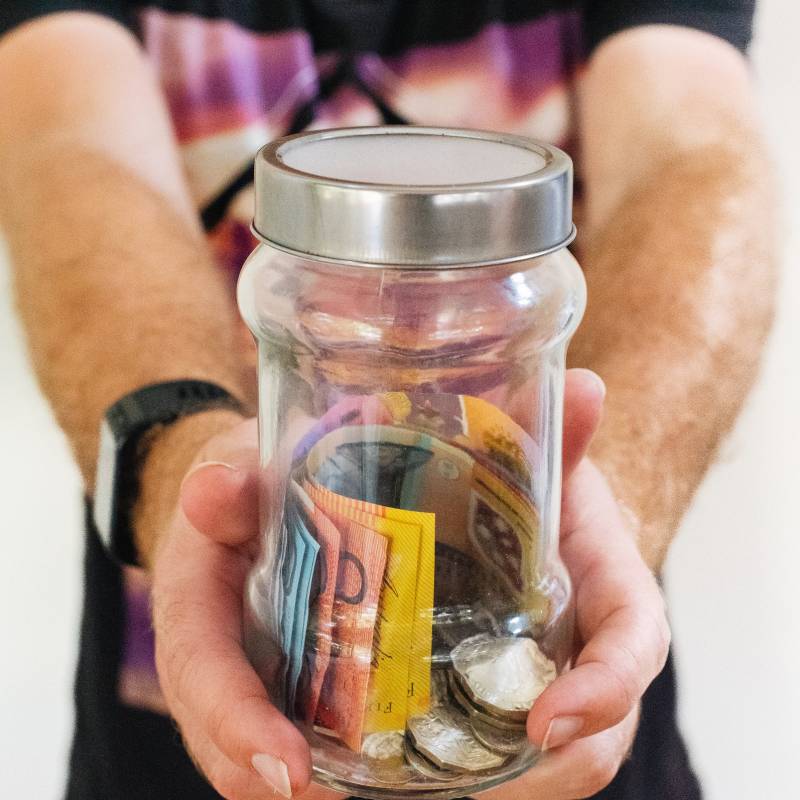 Australian currency inside Jar