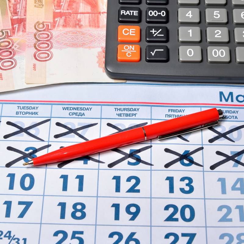 Enchanting Travels Germany Tour The calculation on the calculator and recording pen of the cost of gifts for the holiday on May 9. Business still life