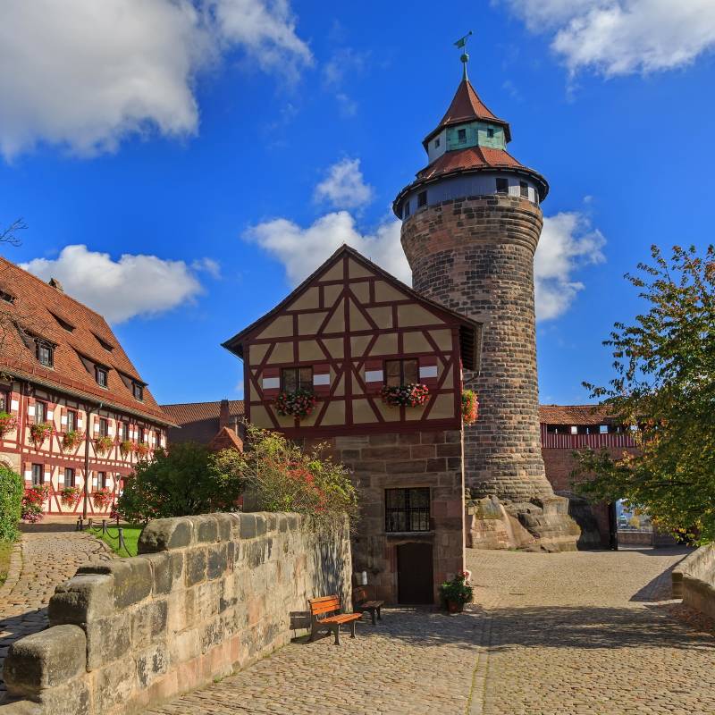 Nuremberg Castle (Sinwell tower) with blue sky and clouds, Germany Tours