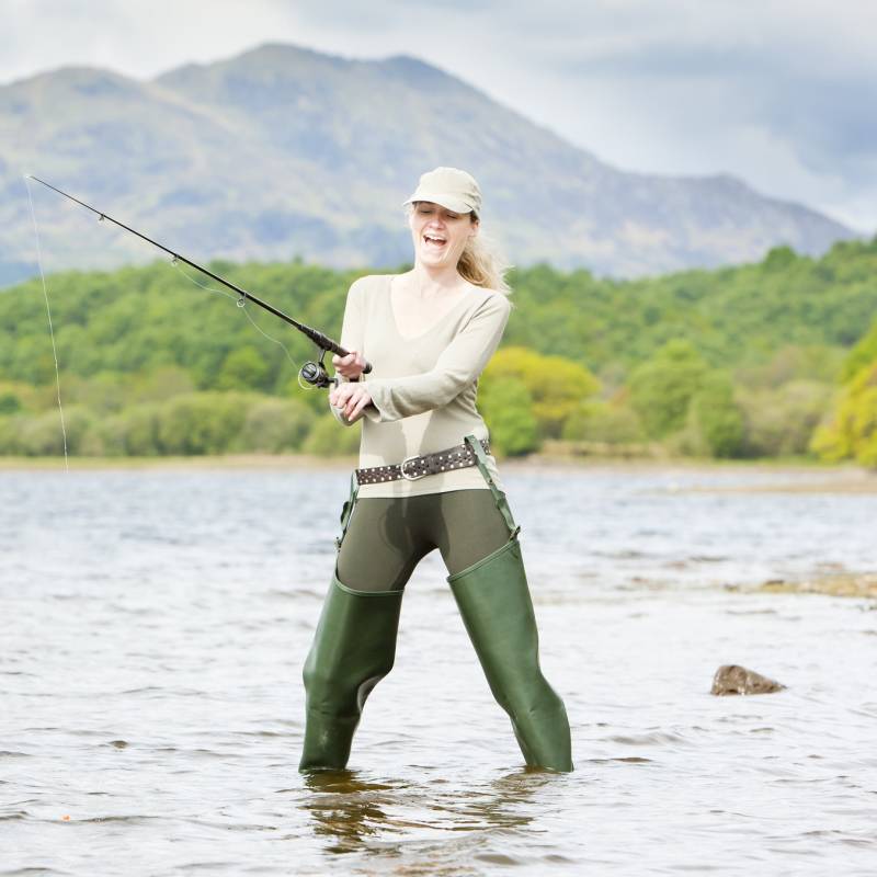 Enchanting Travels UK & Ireland Tours fishing woman, Loch Venachar, Trossachs, Scotland