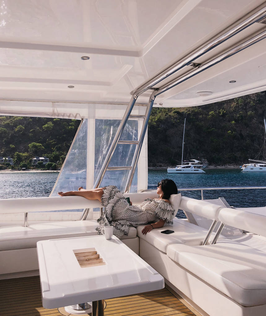 Woman relaxing on yacht