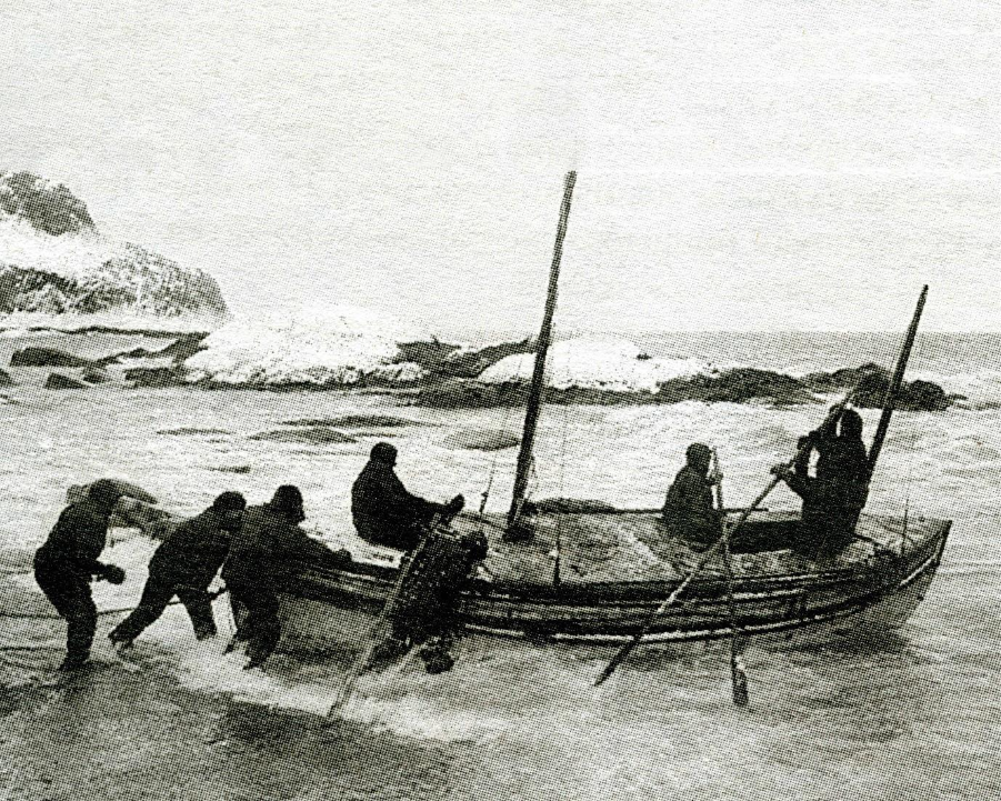 Photo of polar explorers, Ernest Shackleton and his crew onboard ship.