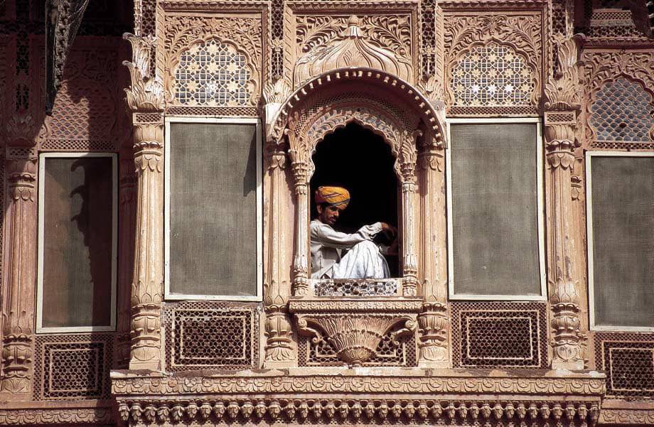 man in window jaisalmer