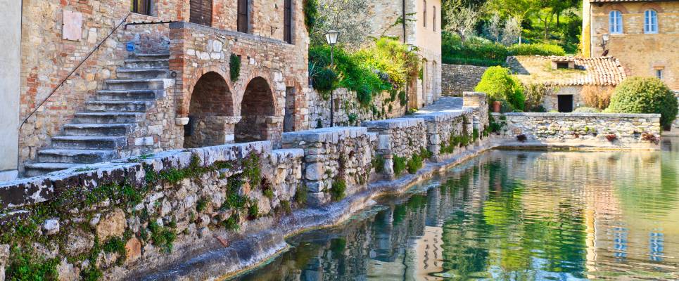 Old thermal baths in the medieval village Bagno Vignoni, Tuscany, Italy