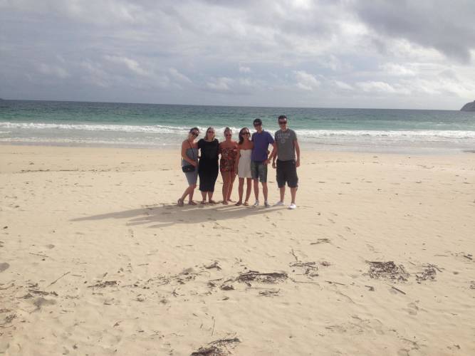 a group of people on a beach