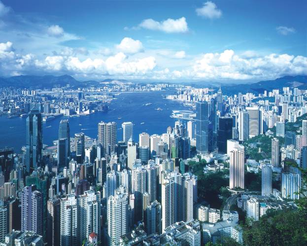a view of Victoria Peak with a mountain in the background