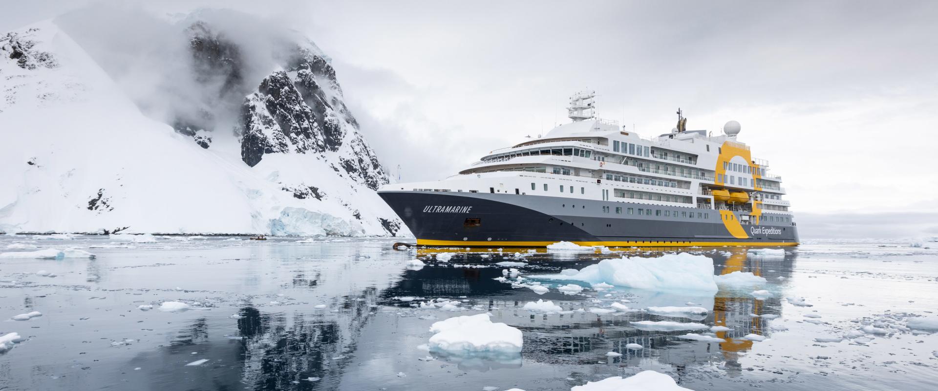 A Quark Expeditions ship among the ice in Antarctica