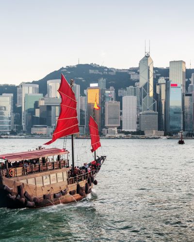 Scenic view of traditional Chinese wooden sailing ship with red sails, Hong Kong Islands, Asia