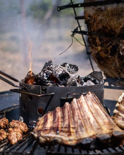 Traditional Argentine ribs grilled with charcoal and fire