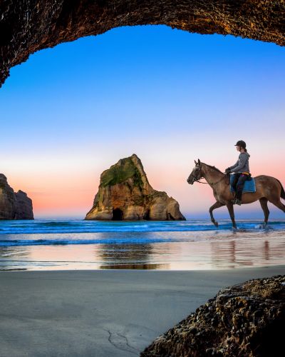 Enchanting-Travels-New-Zealand-tours-view-from-the-cave-of-Wharariki-Beach