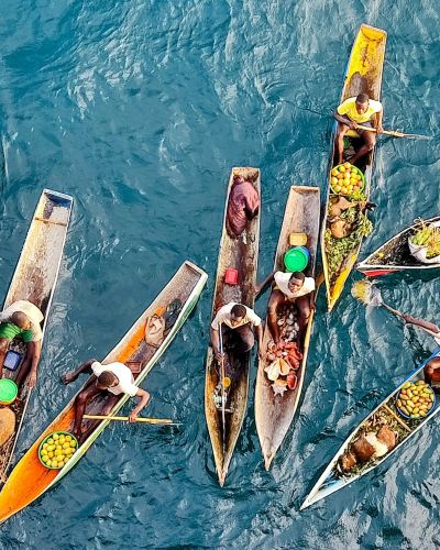 A group of boats floating on top of a body of water Mozambique