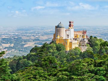 The Pena National Palace is a Romanticist palace in Sao Pedro de Penaferrim, Sintra, Portugal