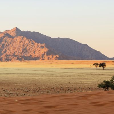 Red sand dunes and granite outcrops in Sesriem, Namibia, Africa