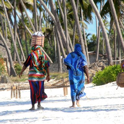 Zanzibar women on sandy beach, Tanzania, Africa