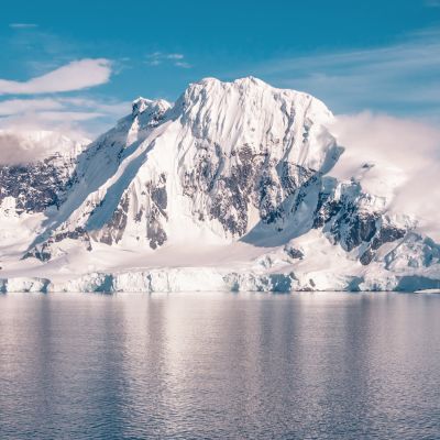 Idyllic lagoon with mountains in the background at the Lemaire Strait, Antarctica